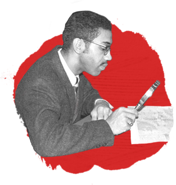 man looking over document